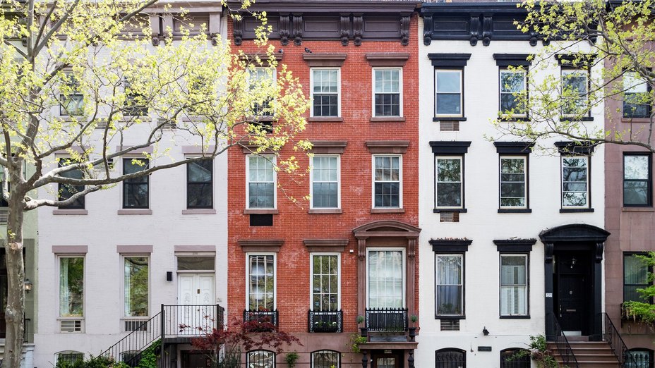 Commercial real estate building in Ontario city skyline highlighting insurance solutions for property owners and landlords.