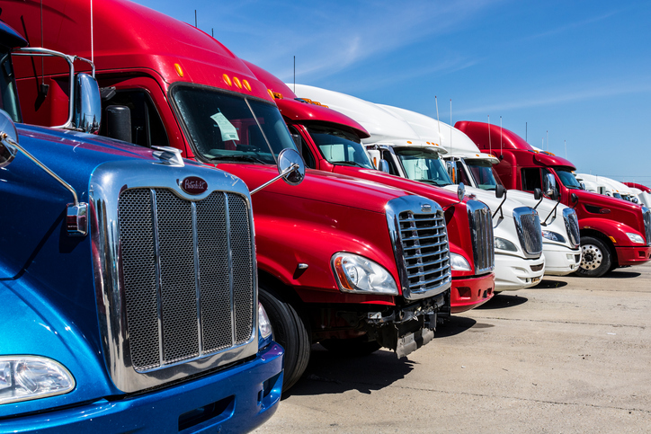 Truck in Ontario loading freight in transit, representing motor truck cargo insurance protection.